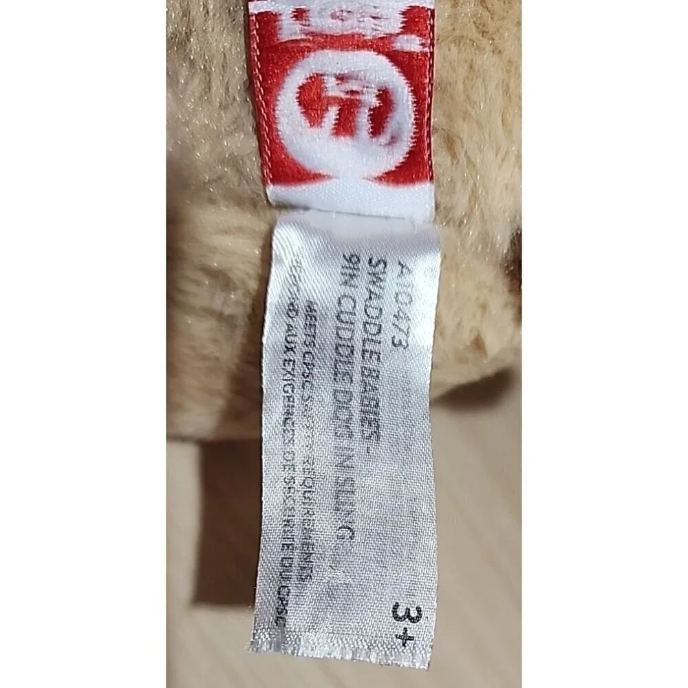 Swaddle Babies Plush Toy Dog Big Brown Eyes 9 inches Fiesta Dog Only